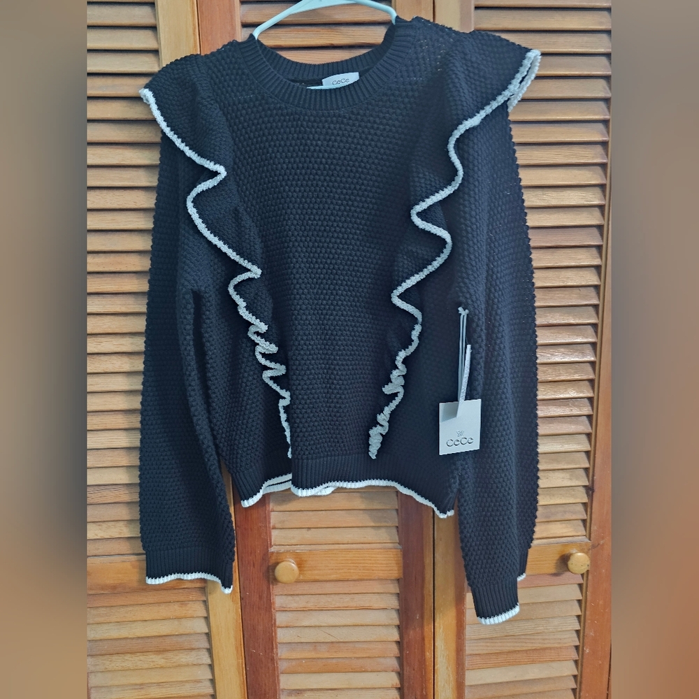 CeCe honeycomb-knit ruffle sweater in rich black, featuring contrast- Ruffles